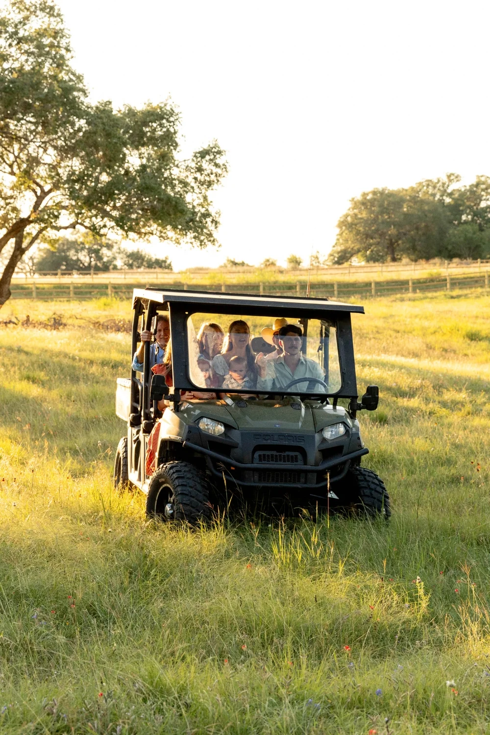 A buyer and a sales team member touring the land at Walker Branch in the UTV.